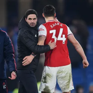 Arsenal's Victory at Stamford Bridge: Mikel Arteta Celebrates with Granit Xhaka