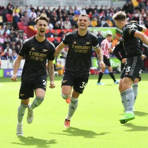 Arsenal's Vieira and Xhaka Celebrate Their Roles in Scoring the Third Goal Against Brentford (2022-23) Arsenal's Vieira and Xhaka Celebrate Their Roles in Scoring the Third Goal Against Brentford (2022-23)