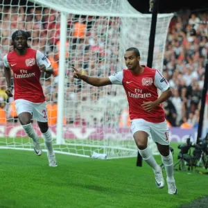 Arsenal's Walcott and Gervinho: Celebrating a Goal in the 2011-12 UEFA Champions League (vs Udinese)