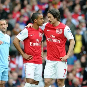 Arsenal's Walcott and Rosicky in Action against Manchester City (2011-12) Arsenal's Walcott and Rosicky in Action against Manchester City (2011-12)
