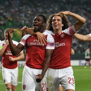 Arsenal's Welbeck and Guendouzi Celebrate Goal in Europa League Match against Sporting Lisbon Arsenal's Welbeck and Guendouzi Celebrate Goal in Europa League Match against Sporting Lisbon