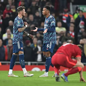 Arsenal's White and Gabriel Clash Heads in Intense Carabao Cup Semi-Final Battle Against Liverpool