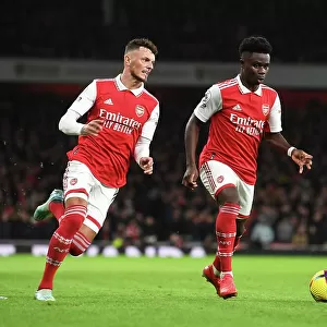 Arsenal's White and Saka in Action: Arsenal FC vs Newcastle United, Premier League 2022-23