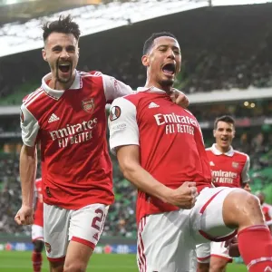 Arsenal's William Saliba and Fabio Vieira Celebrate Goal in Europa League Clash against Sporting Lisbon