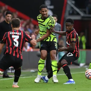 Arsenal's William Saliba Faces Pressure from Bournemouth's Luis Sinisterra in Premier League Clash (AFC Bournemouth vs Arsenal 2023-24) Arsenal's William Saliba Faces Pressure from Bournemouth's Luis Sinisterra in Premier League Clash (AFC Bournemouth vs Arsenal 2023-24)