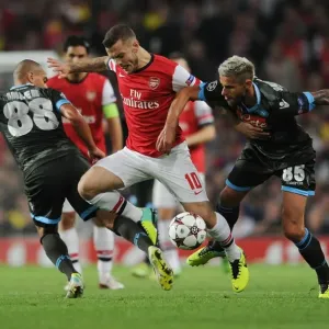 Arsenal's Wilshere Faces Off Against Inler and Behrami of Napoli in Champions League Clash Arsenal's Wilshere Faces Off Against Inler and Behrami of Napoli in Champions League Clash