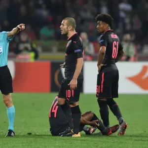 Arsenal's Wilshere and Nelson Protest Referee Decision Against Crvena Zvezda