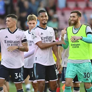 Arsenal's Winning Duo: Saliba and Turner Celebrate Premier League Victory at AFC Bournemouth (2022-23)