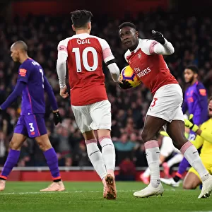 Arsenal's Winning Moment: Welbeck and Ozil Celebrate Goal vs. Liverpool (2018-19)