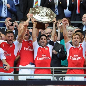 Arsenal's Winning Squad: Bellerin, Mertesacker, Arteta, Monreal, and Giroud Lift the FA Community Shield