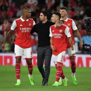 Arsenal's Winning Team: Arteta Celebrates with Gabriel, Martinelli, and White Arsenal's Winning Team: Arteta Celebrates with Gabriel, Martinelli, and White