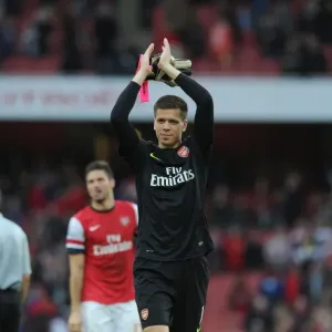 Arsenal's Wojciech Szczesny Celebrates with Fans after Arsenal v Norwich City Victory (2013-14) Arsenal's Wojciech Szczesny Celebrates with Fans after Arsenal v Norwich City Victory (2013-14)