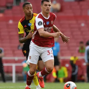 Arsenal's Xhaka Clashes with Watford's Joao Pedro in Premier League Showdown