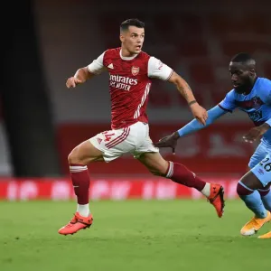 Arsenal's Xhaka Clashes with West Ham's Masuaka in Premier League Showdown