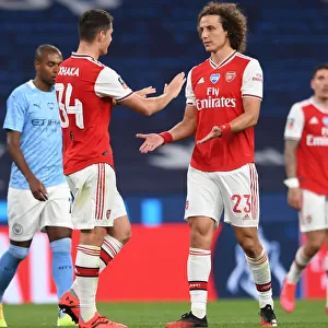 Arsenal's Xhaka and Luiz Embrace After FA Cup Semi-Final Showdown Against Manchester City