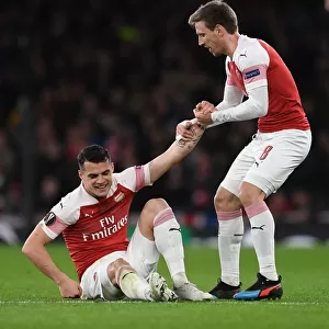 Arsenal's Xhaka and Monreal in Action during Europa League Clash against Stade Rennais