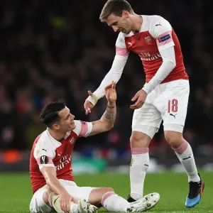 Arsenal's Xhaka and Monreal Focused During Europa League Clash Against Stade Rennais