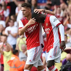 Arsenal's Xhaka and Pepe Celebrate Goal: Arsenal vs. Chelsea Pre-Season Clash, 2021-22