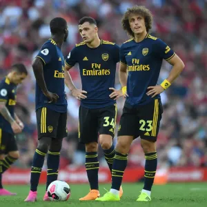 Arsenal's Xhaka, Pepe, and Luiz Face Off Against Liverpool in Premier League Clash Arsenal's Xhaka, Pepe, and Luiz Face Off Against Liverpool in Premier League Clash