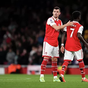 Arsenal's Xhaka and Saka: A Moment of Connection Amidst the Intense Arsenal v Chelsea Rivalry (2022-23)