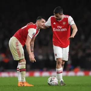 Arsenal's Xhaka and Sokratis in Action Against Leeds United in FA Cup Third Round Arsenal's Xhaka and Sokratis in Action Against Leeds United in FA Cup Third Round