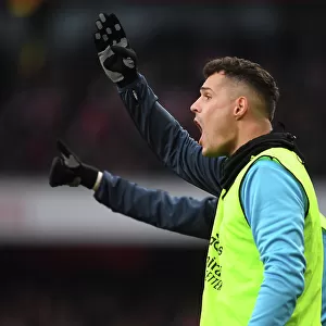 Arsenal's Xhaka Watches from the Sidelines During Arsenal v AFC Bournemouth Premier League Match, 2022-23