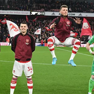 Arsenal's Xhaka, White, and Ramsdale Prepare for Liverpool Clash in Premier League (2021-2022)
