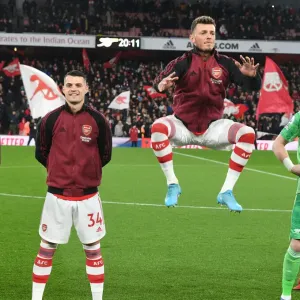 Arsenal's Xhaka, White, and Ramsdale Prepare for Liverpool Clash in Premier League (2021-2022)