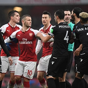 Arsenal's Xhaka and Wilshere Go Head-to-Head with Van Aanholt and Milivojevic: A Midfield Battle in Arsenal vs. Crystal Palace Clash