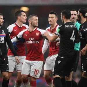 Arsenal's Xhaka and Wilshere Go Head-to-Head with Van Aanholt and Milivojevic: A Midfield Battle in Arsenal vs. Crystal Palace Clash Arsenal's Xhaka and Wilshere Go Head-to-Head with Van Aanholt and Milivojevic: A Midfield Battle in Arsenal vs. Crystal Palace Clash