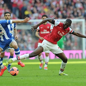 Arsenal's Yaya Sanogo Faces Off Against Wigan's James McArthur in FA Cup Semi-Final Showdown