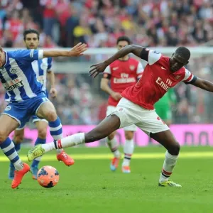 Arsenal's Yaya Sanogo Faces Off Against Wigan's James McArthur in FA Cup Semi-Final Showdown Arsenal's Yaya Sanogo Faces Off Against Wigan's James McArthur in FA Cup Semi-Final Showdown