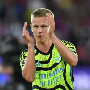 Arsenal's Zinchenko Celebrates with Fans: Crystal Palace Victory in 2023-24 Premier League Arsenal's Zinchenko Celebrates with Fans: Crystal Palace Victory in 2023-24 Premier League