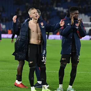 Arsenal's Zinchenko Celebrates Victory over Brighton with Fans