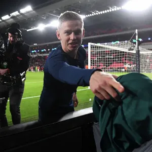 Arsenal's Zinchenko Delights Fan with Shirt Gift After Champions League Victory Arsenal's Zinchenko Delights Fan with Shirt Gift After Champions League Victory
