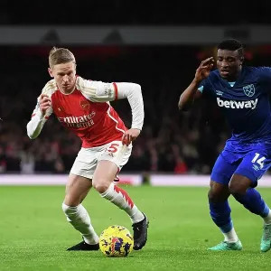 Arsenal's Zinchenko Fends Off West Ham's Kudus in Premier League Clash (2023-24)