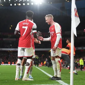 Arsenal's Zinchenko, Trossard, and Saka Celebrate Goals Against Burnley in 2023-24 Premier League Arsenal's Zinchenko, Trossard, and Saka Celebrate Goals Against Burnley in 2023-24 Premier League