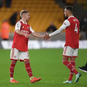 Arsenal's Zinchenko and White Celebrate Victory Over Wolverhampton Wanderers in 2022-23 Premier League