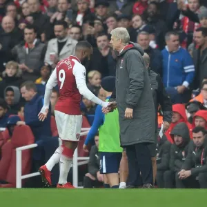 Arsene Wenger and Alexandre Lacazette: A Heartfelt Farewell on the Arsenal Touchline (Arsenal v Tottenham Hotspur 2017-18)