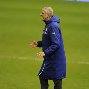 Arsene Wenger at Anfield: A Clash of Premier League Titans (Liverpool vs. Arsenal, 2014) Arsene Wenger at Anfield: A Clash of Premier League Titans (Liverpool vs. Arsenal, 2014)