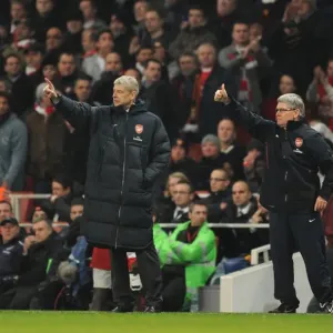 Arsene Wenger the Arsenal Manager and his assistant Pat Rice. Arsenal 0: 0 Manchester City