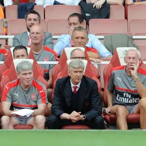 Arsene Wenger the Arsenal Manager on the bench with Gary Lewin (Physio), Pat Rice