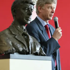 Arsene Wenger the Arsenal Manager with his bust