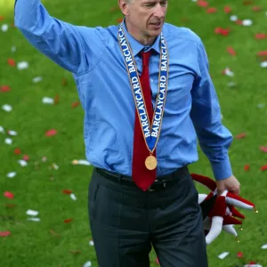 Arsene Wenger the Arsenal Manager celebrates at the end of the match