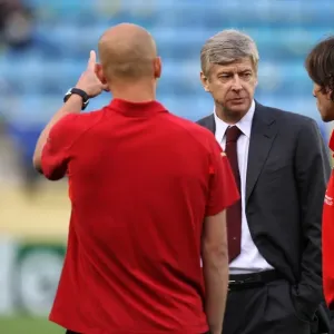 Arsene Wenger the Arsenal Manager chats to ex Arsenal