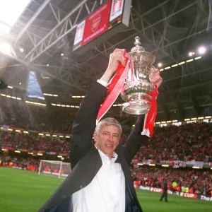 Arsene Wenger the Arsenal Manager with the FA Cup Trophy