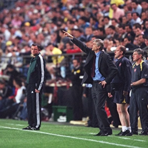 Arsene Wenger the Arsenal Manager gives instructions fromthe touchline