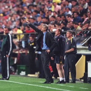 Arsene Wenger the Arsenal Manager gives instructions fromthe touchline