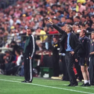 Arsene Wenger the Arsenal Manager gives instructions fromthe touchline Arsene Wenger the Arsenal Manager gives instructions fromthe touchline