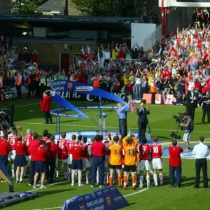 Arsene Wenger the Arsenal Manager lifts the Premiership Trophy Arsene Wenger the Arsenal Manager lifts the Premiership Trophy